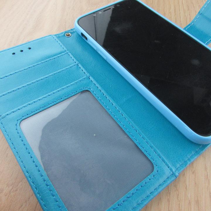 Actual product image PhoneLook Coque Premium Flip Turquoise (Apple iPhone X)