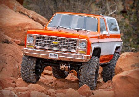 Immagine prodotto Traxxas TRX-4 79 Chevy Blazer arancione/bianco 1/10 Crawler RTR spazzolato, Clipless, senza batteria e (RTR pronto all'uso)