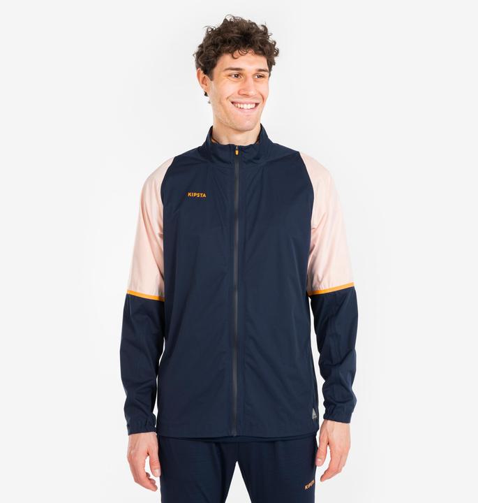 Produktbild Kipsta Damen/Herren Fussball Regenjacke - CLR marineblau/orange (L)