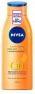 Actual product image NIVEA Q10+ reafirmante y autobronceadora body milk 400 ml (Self tanning cream, 400 ml)