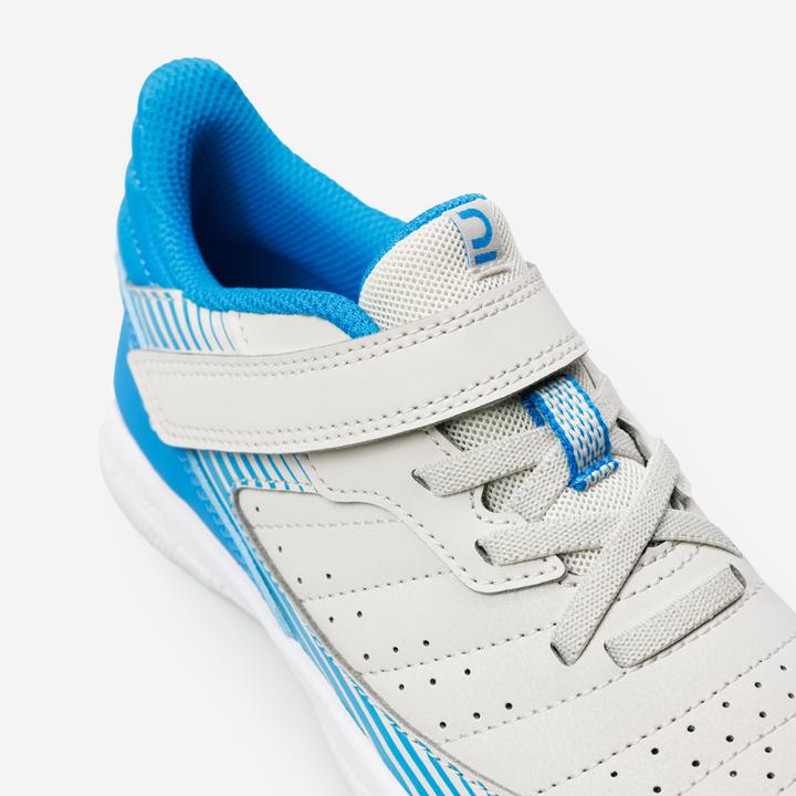Immagine prodotto Kipsta Scarpe da calcio indoor per bambini - Eskudo 500 beige/blu (34)