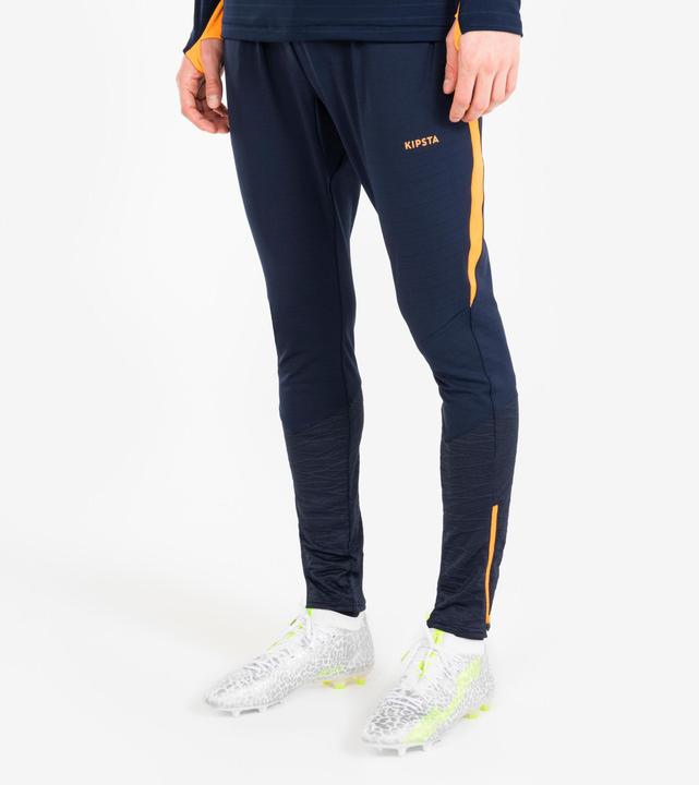 Actual product image Kipsta Women's/men's football training trousers - CLR orange/navy blue (W34/L34)