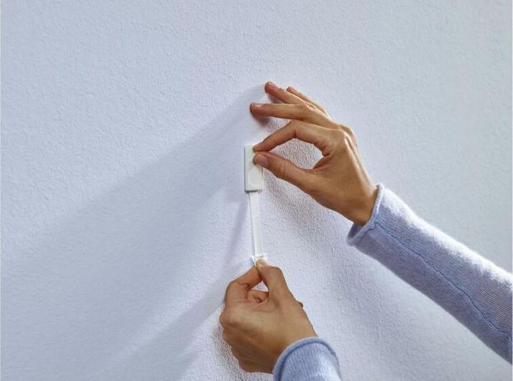 Actual product image tesa adhesive nail for wallpaper and plaster, 0,5 kg