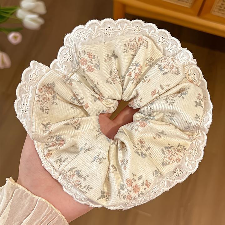 Produktbild Activity Board 1 Stk. Elegantes, florales Haargummi mit Spitzenbesatz - weicher Stoff, zartes Blumendesign (Haargummi)