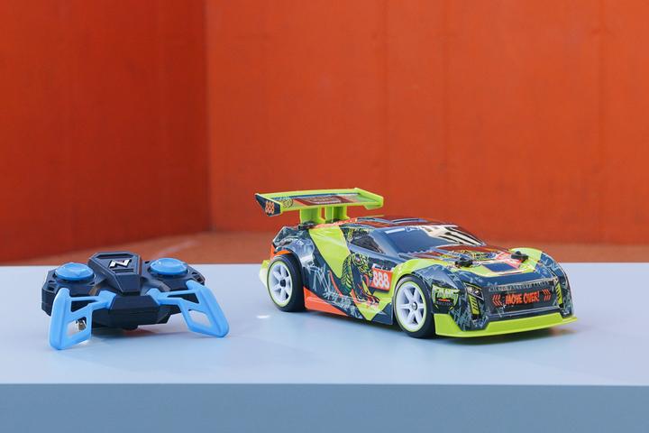 Actual product image Nikko 10132 Racing Series Fang Racing, remote control racing car, RC vehicle up to 14 Km/h, powerful...