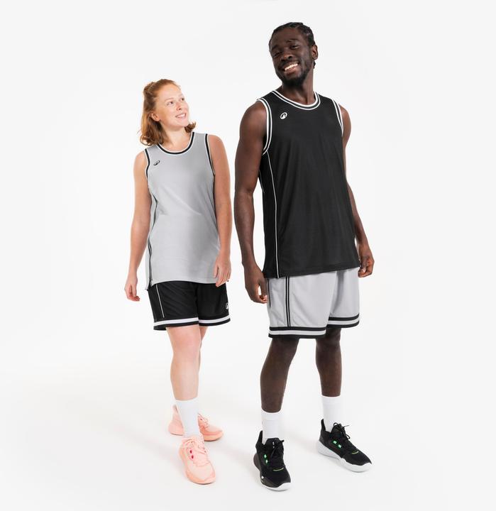 Immagine prodotto Kipsta Damen/Herren Basketball Trikot wendbar leicht - SHR 500 schwarz-weiss (XS)