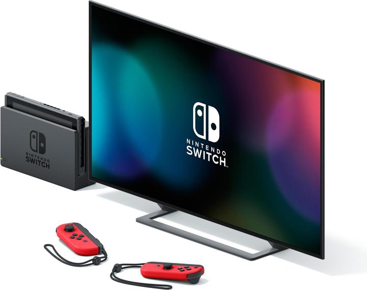 Image du produit Nintendo Switch Rouge + Code de téléchargement Super Mario Odyssey + Autocollant du film Super Mario Bros.