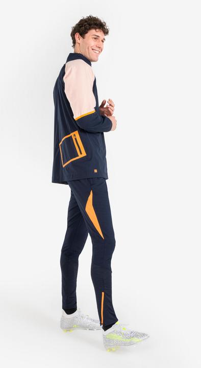 Actual product image Kipsta Women's/men's football training trousers - CLR orange/navy blue (W34/L34)