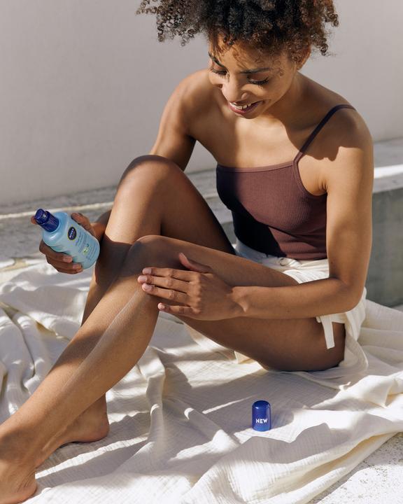 Produktbild NIVEA Mixpack Kids Sensitive Spray LSF50 400ml +After Sun Spray (Sonnenspray, SPF 50, 400 ml, 458 g)