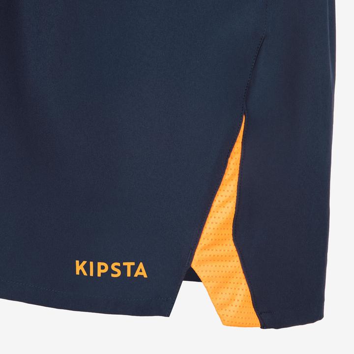 Immagine prodotto Kipsta Pantaloncini da calcio da donna/uomo - CLR blu navy/arancio (M)