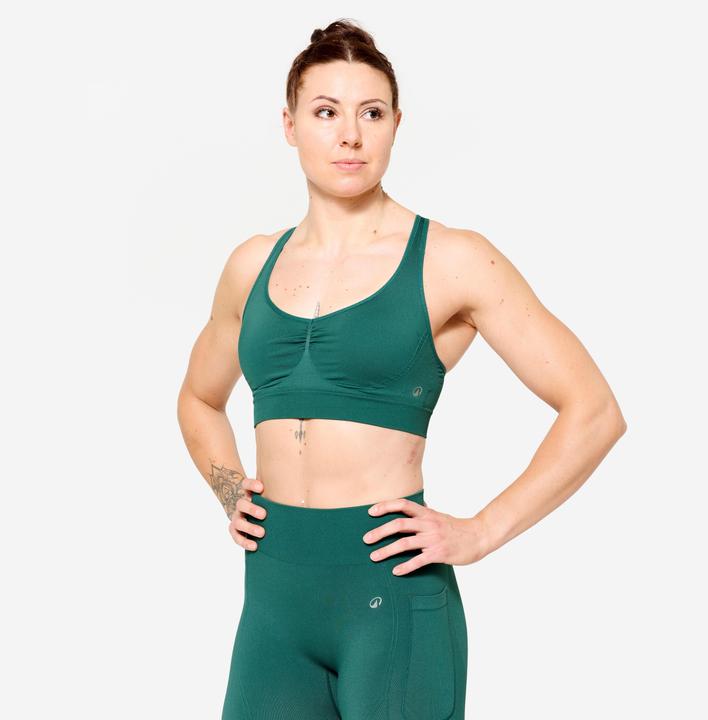 Produktbild Decathlon Sport-Bustier Damen gekreuzte Träger leichter Halt - türkis (S)