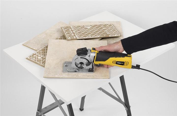 Produktbild Powerplus POWX1365MB Kreissäge - 600W - 89mm - Inkl. Laser, Absaugung, 3 Kreissägeblätter und Gehrungslade