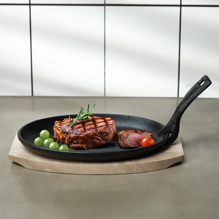 Immagine prodotto Casativo Padella professionale in ghisa con sottopentola in legno, 24 x 14 x 2,2 cm (Padella per friggere, Ghisa)