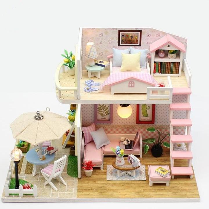 Produktbild Ikonka Zusammenklappbares Holzmodell Puppenhaus LED