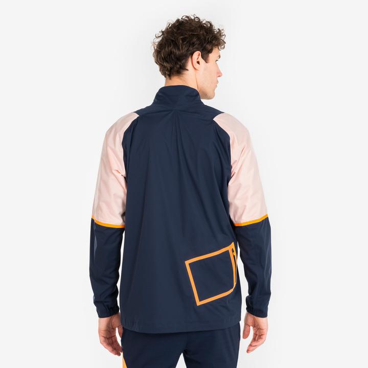 Produktbild Kipsta Damen/Herren Fussball Regenjacke - CLR marineblau/orange (L)