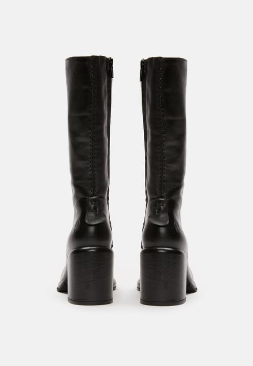 Image du produit Felmini SIMONA D571, la botte à talon de, est fabriquée en cuir lisse noir et confère (38)