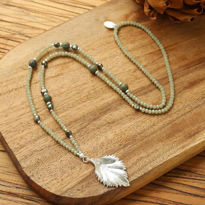 Actual product image Andreani Necklace with leaf pendant made of genuine green freshwater pearls with glass (Glass)