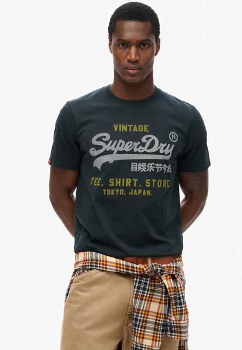 Immagine prodotto Superdry T-Shirt Casual Bequem sitzend VI Heritage Relaxed Tee (XL)