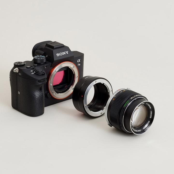 Immagine prodotto Urth Adattatore per obiettivo: compatibile con l'obiettivo Olympus OM e il corpo macchina Sony E