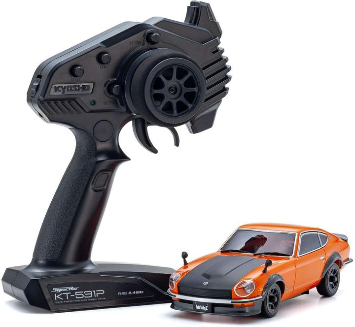 Immagine prodotto Kyosho Mini-Z MA020 Nissan Fairlady 240 ZL 1:27, arancione, set pronto per l'uso (ARR Quasi lettura a corredo)