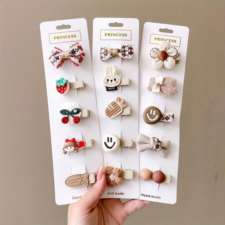 Image du produit Activity Board 15/20pcs pinces à cheveux en forme d'animaux de dessins animés avec un visage souriant et un noeud (20 pcs)