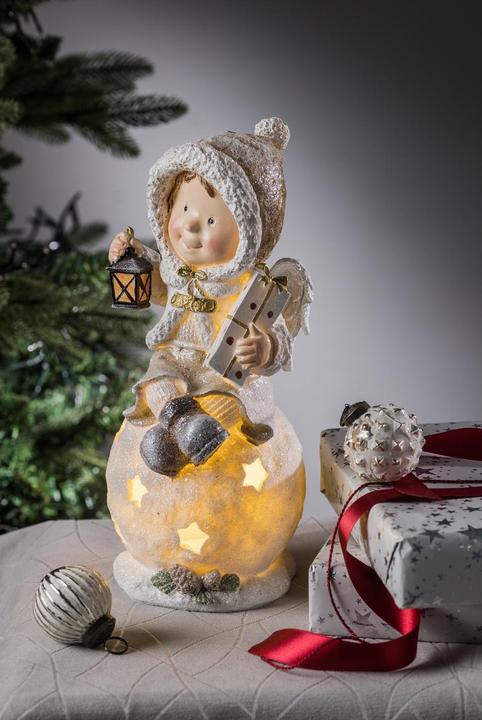Immagine prodotto GuGus Figura LED di un bambino seduto su una palla in poliresina con lanterna e ali d'angelo