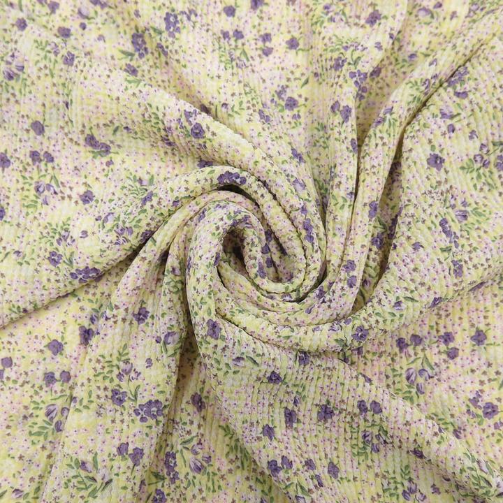 Immagine prodotto Stoffrestposten Chiffon plissettato - Fiori sparsi in giallo pastello - Quantità minima: 1 metro