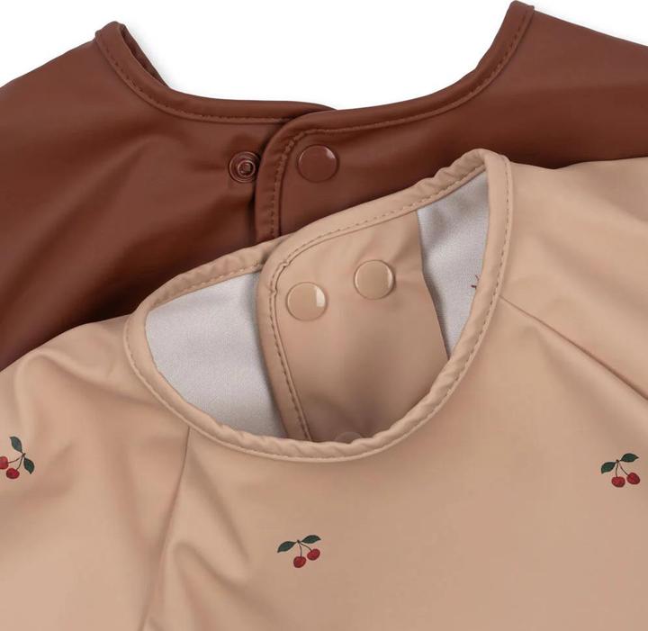 Actual product image Konges Slojd Dinner Bib with Sleeves Cherry 2 Pack