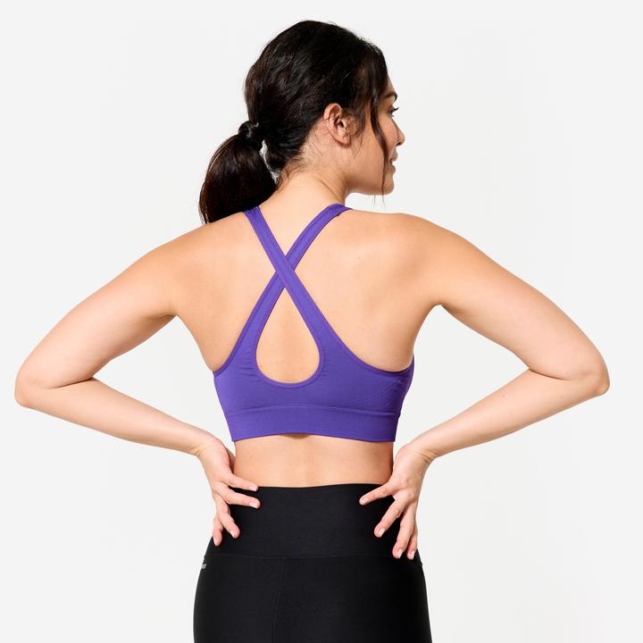 Actual product image Decathlon Women's sports bustier with crossed straps for light support - purple (XL)