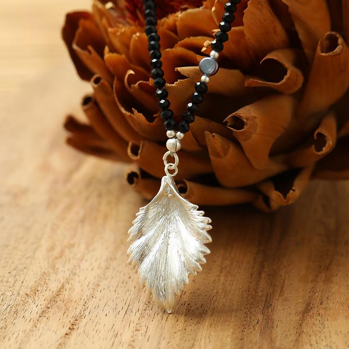 Image du produit Andreani Collier avec pendentif feuille en véritables perles noires d'eau douce avec verre (Verre)