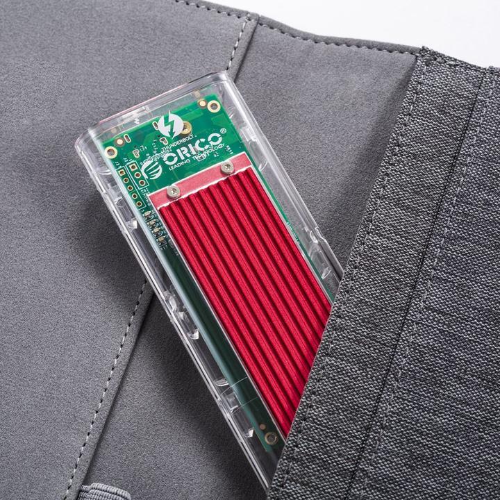 Actual product image Orico Other Computer Accessory TCM2-C3 M.2 NVME to USB-C 10Gb/s Disk Drive - Red (M.2)