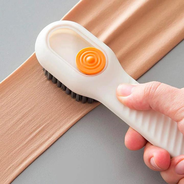 Produktbild JTI Reinigungsbürste für Schuhe - integrierter Spender (1 x)