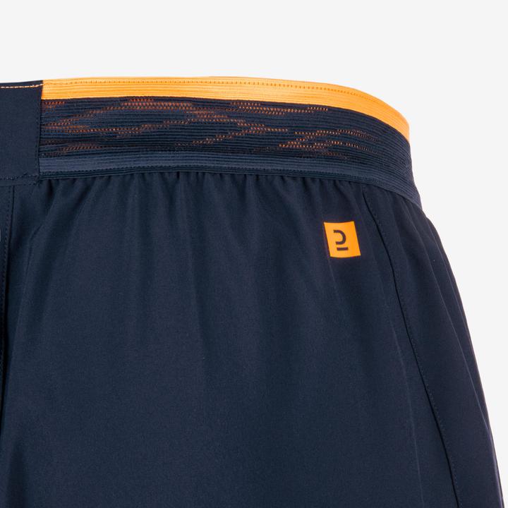 Image du produit Kipsta Short de football homme/femme - CLR bleu marine/orange (XS)
