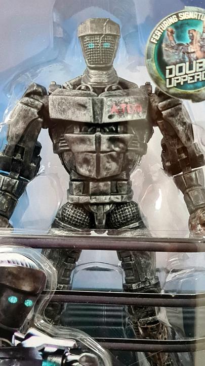 Immagine prodotto Jakks Pacific Figura d'azione della Serie 1 di Real Steel: Atom il Bot della discarica