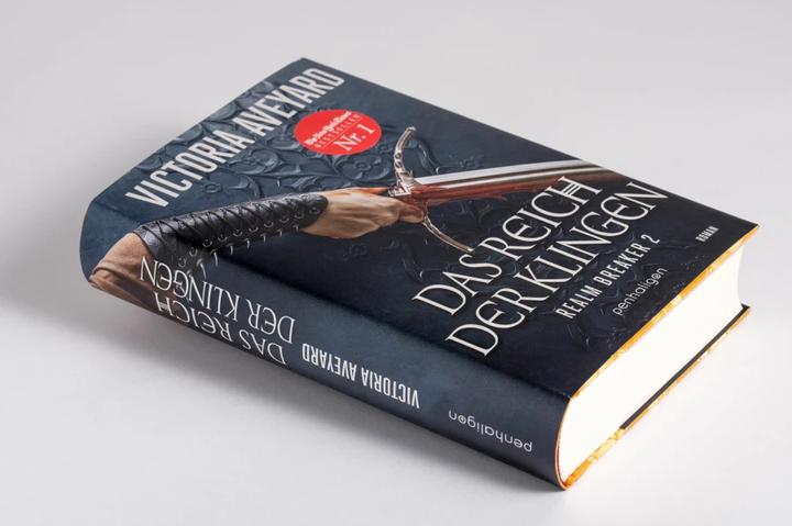 Actual product image Das Reich der Klingen - Realm Breaker 2 (German, Victoria Aveyard, 2022)