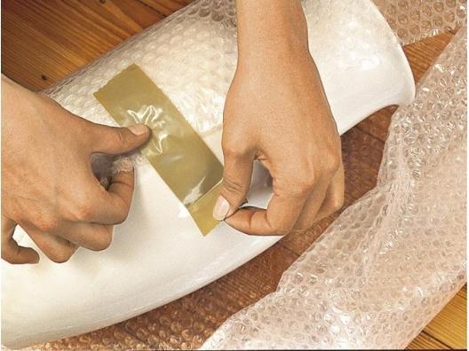 Actual product image tesa tesapack ULTRA STRONG Parcel Tape - PVC packing tape for tight packing and secure bundling (38 mm)