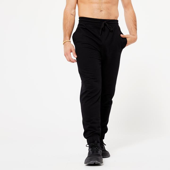 Immagine prodotto Domyos Pantaloni da jogging caldi da uomo - 100 nero (W34/L34)