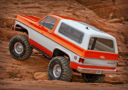 Immagine prodotto Traxxas TRX-4 79 Chevy Blazer arancione/bianco 1/10 Crawler RTR spazzolato, Clipless, senza batteria e (RTR pronto all'uso)