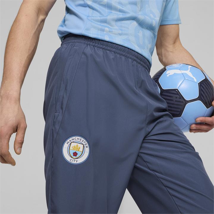 Immagine prodotto Puma Pantaloni MCFC Prematch Woven Pant (L)