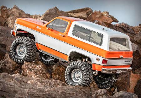 Immagine prodotto Traxxas TRX-4 79 Chevy Blazer arancione/bianco 1/10 Crawler RTR spazzolato, Clipless, senza batteria e (RTR pronto all'uso)
