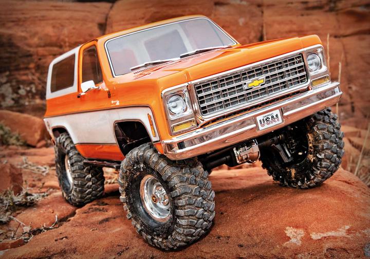 Immagine prodotto Traxxas TRX-4 79 Chevy Blazer arancione/bianco 1/10 Crawler RTR spazzolato, Clipless, senza batteria e (RTR pronto all'uso)
