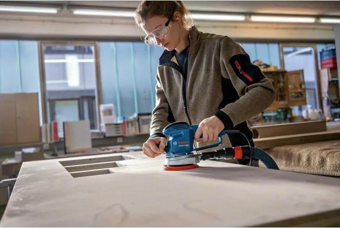 Produktbild Bosch Professional Exzenterschleifer GEX 34-150, Schleifteller, 1 x Pap.staub-btl., 1 x Absaugad. (Exzenterschleifer, 340 W)