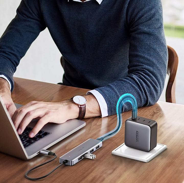 Produktbild Ugreen HUB CM219 35574 with 4 USB-A 3.0 ports and USB-A 3.0 cable 1m - black (USB-A, 4 Ports)