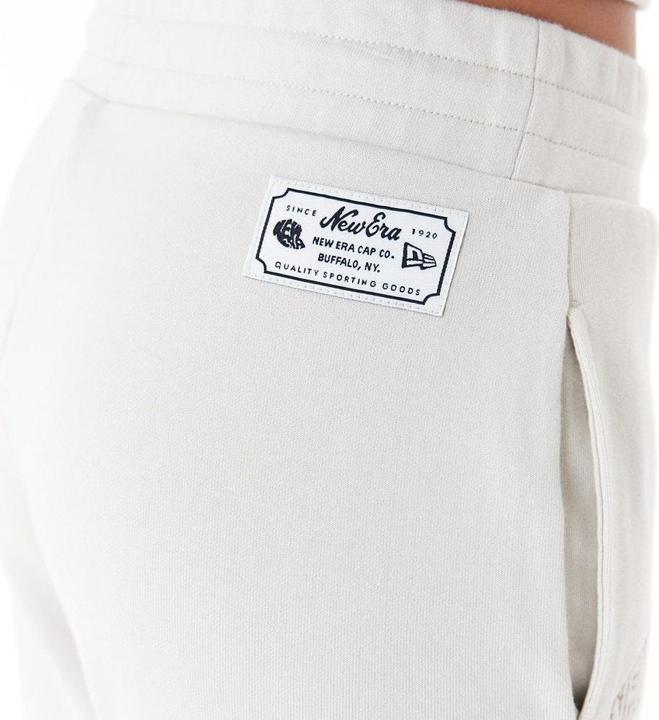 Immagine prodotto New Era Pantaloni da jogger da donna in beige stone (M)