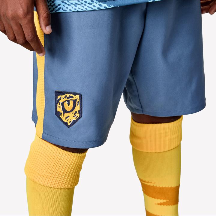 Produktbild Kipsta Kinder Fussball Shorts - VIRALTO Kids grau mit orangem Streifen (122)