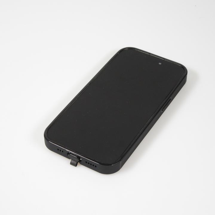 Actual product image PhoneLook Coque Silicone Glossy lumière LED intégrée avec port USB-C Floating Astronaut (Apple iPhone 15)