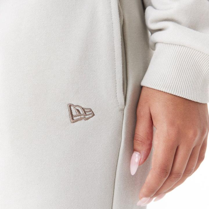 Immagine prodotto New Era Pantaloni da jogger da donna in beige stone (M)