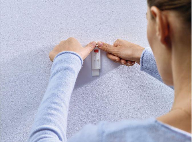 Actual product image tesa Adhesive nail wallpaper & plaster height adjustable