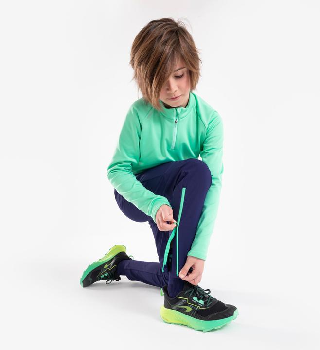 Immagine prodotto Kiprun Pantaloni da corsa caldi da bambino con zip - Warm 900 blu scuro/verde (122)