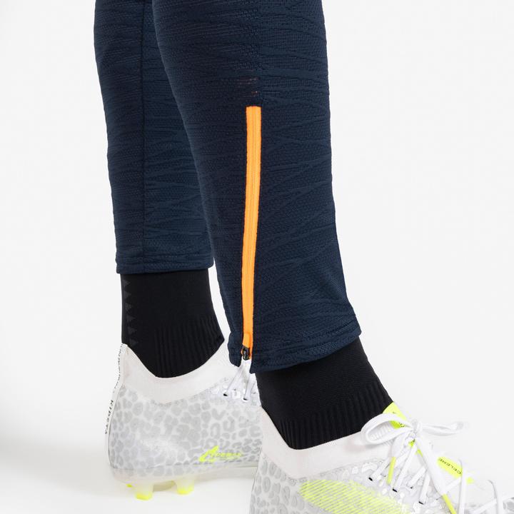 Actual product image Kipsta Women's/men's football training trousers - CLR orange/navy blue (W34/L34)